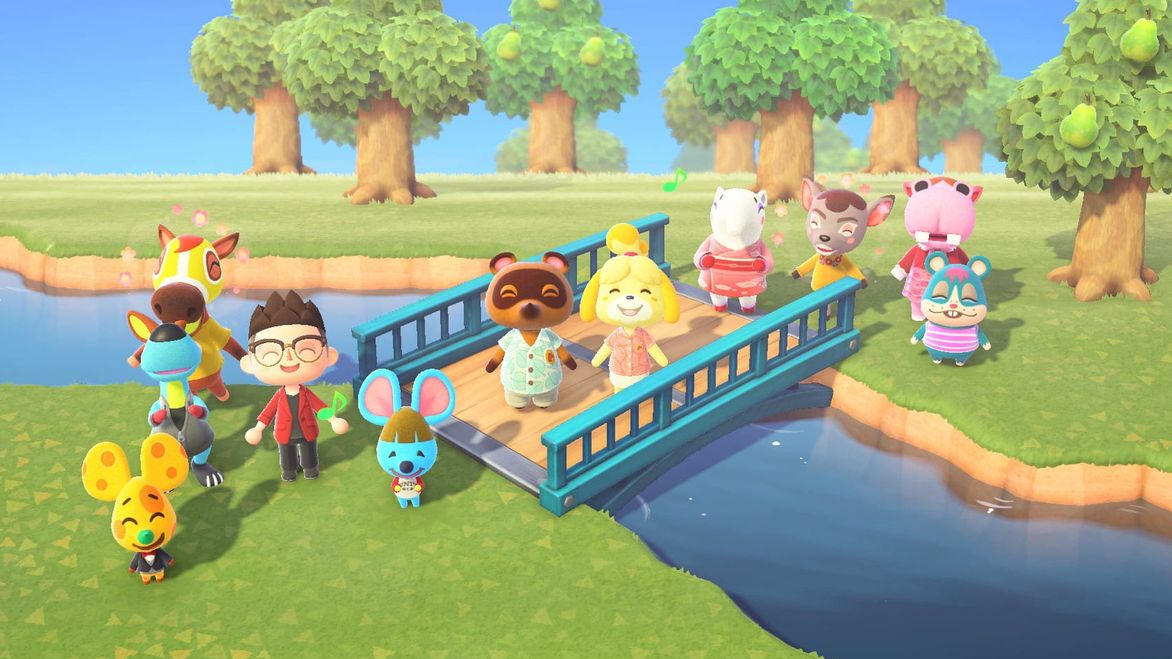 In-game image from Animal Crossing of a collection of characters standing either side of a river, with Tom Nook and Isabelle standing on a bridge.