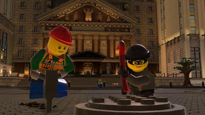 In-game image from LEGO City Undercover of two LEGO characters breaking into the ground using a crowbar and drill.